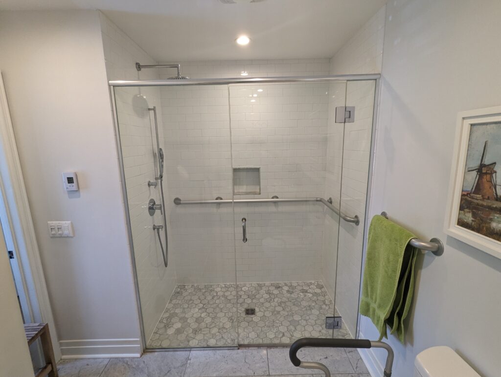 Elder proof shower with handrail.